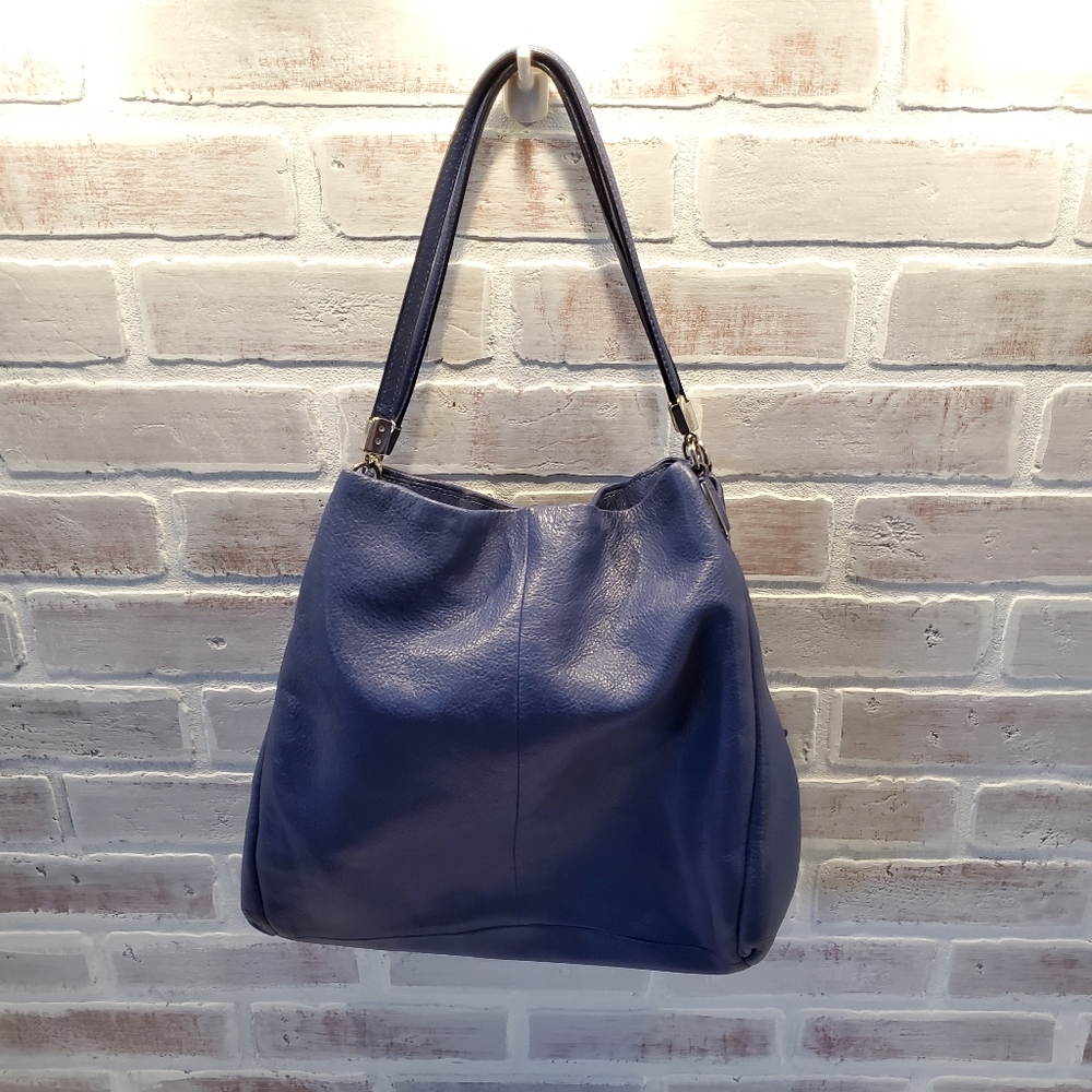 Coach..not factory...blue leathet